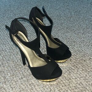 Black, strappy, women’s size 8.5 heels